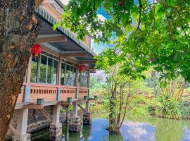 Homestay tay，位于Xã Trảng Bôm江典瀑布旅游胜地附近的酒店