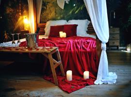 L'Evasion romantique en Amazonie, SPA, Écran cinéma, day use, Lit baldaquin，位于埃夫勒的酒店