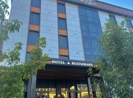 Graf Hotel，位于奇姆肯特Shymkent International Airport - CIT附近的酒店