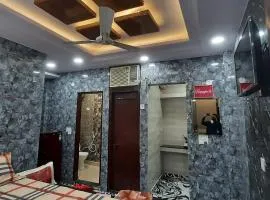 Aggarwal luxury room with private kitchen washroom and balcony along with fridge, Ac, Android tv, wifi in main lajpat nagar