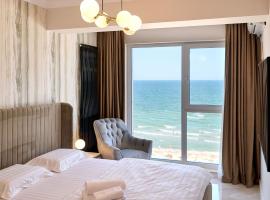 Beach Bliss Apartment in Infinity Beach Resort parking，位于马马亚的Spa酒店