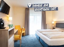 Roomingtons Hotel Lohr am Main，位于劳尔的酒店