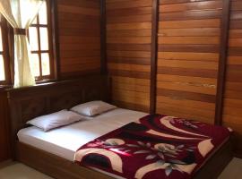 Roemah Kayu Saragan Syariah Magelang Mitra RedDoorz，位于Banyurojo的酒店