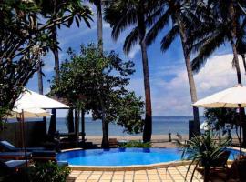 巴厘布纳海滩小屋酒店，位于艾湄湾的酒店