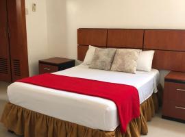 Hoteles en Guayaquil - Suites Guayaquil Cerca del Aeropuerto，位于瓜亚基尔西蒙波利瓦尔区的酒店
