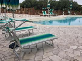 agriturismo gli olivastri -appartamento sole mare con piscina ,solarium e vista mare,climatizzatore ,wifi，位于阿列恩图的酒店