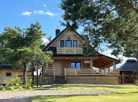 Mazury "Willa Ślimakowo" w Pasymiu - jacuzzi, sauna, pomost, łódka, rower wodny，位于帕瑟姆的酒店