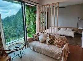 Unique Boho Style Condo with NETFLIX for up to 5PAX - Enjoy Mountain View while swimming at the Infinity Pool & Natural Hotspring Pool, 2mins walk to the Lost World of Tambun, Water Themepark at IPOH