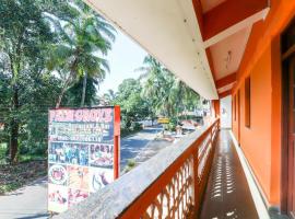 OYO Palmgrove Residency，位于卡乌罗西姆的酒店