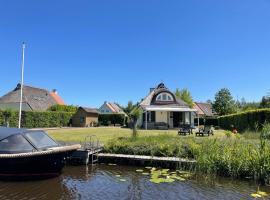 Vakantiehuis aan het water in Friesland，位于De Rijlst的度假短租房