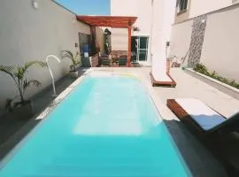 Ivana Imoveis - Casa com Piscina na Praia do Morro á 2 minutos da praia