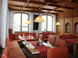 陶尔米纳比萨餐厅旅馆，位于罗斯豪普滕的酒店