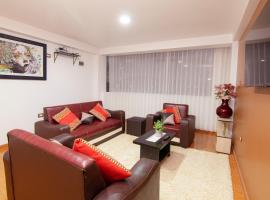 Apartahotel KIRI para empresas y familias que viajan en grupo cerca del Aeropuerto Juliaca Perú,con agua caliente，位于胡利亚卡的酒店