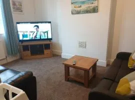 Large first floor flat walking distance to beach