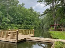 Lakefront Hamilton Cabin with Dock and Fire Pit!