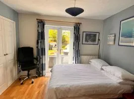 Choice of One double bedroom with a comfy double bed and private en suite for solo travellers or couples ,or alternatively book two double bedrooms for families or friends