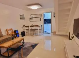 TRP16 - Cozy 2BR Townhouse near Clark Airport, Aquaplanet & Dino Island