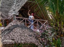 Ladha ya Zanzibar Beachfront Villa，位于江比阿的酒店