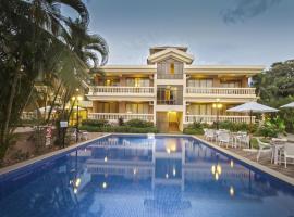 De Mandarin Beach Resort Suites & Villas, Candolim，位于坎多林的酒店