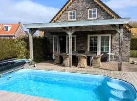Gemütliches Ferienhaus mit beheiztem Pool, Garten und überdachter Terrasse