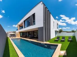 Luxury villa with private indoor and outdoor swimming pool