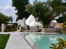 IL TRULLO BIANCO - Country House & SPA，位于卡斯特拉纳格罗泰的酒店