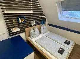 #6 Familienzimmer mit Gemeinschaftsbad