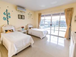 สวนปาล์มฟาร์มนกรีสอร์ท Suanpalm Farm Nok Resort，位于Ban Khao Khwai Hak的酒店