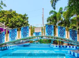 Hotel Playa Salguero By GEH Suites，位于圣玛尔塔的带泳池的酒店