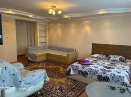 Уютная квартира Н.Абдирова 32，位于卡拉甘达的公寓