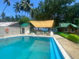 Seaside traveler's Inn by Camiguin Island Home，位于Catarman的酒店