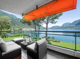 Emotion Lake View - Happy Rentals，位于卡波拉戈Baptistery of Riva San Vitale附近的酒店