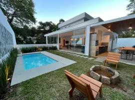 Casa 10 Floresta Boa Vista - Piscina Privativa, Adega e Conforto em 4 suítes