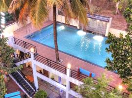 Coorg Avani Holiday Inn，位于马迪凯里的酒店