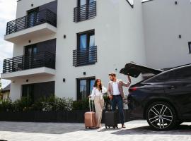 Resto Inn - Smart apartamenty blisko Energylandii，位于Po”łwieś的酒店