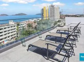 Torre con roof garden y piscina vista al mar