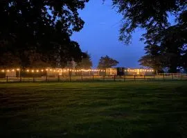 The Shepherds Huts & The Well Lodge at Ormesby Manor