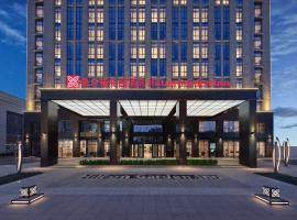 天津华苑希尔顿花园酒店，位于天津Xiqing的酒店