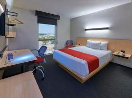 特瓦坎都市快捷酒店，位于提瓦坎的酒店