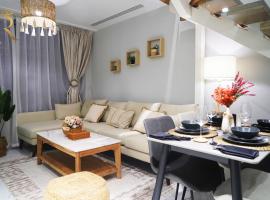 2BR SkyHome at Jade Masdar City，位于Al Qurayyah的酒店