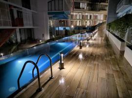 Encanto Cayala, Acogedor y Moderno apartamento en Cayala con Aire Acondicionado，位于危地马拉的带停车场的酒店