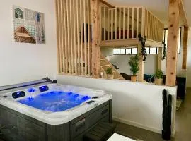 Loft avec jacuzzi et terrasse privés