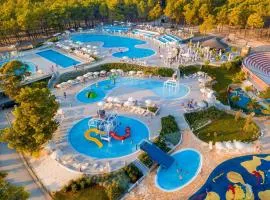 Mobile homes in Zaton Holiday Resort, with large pool area