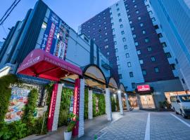 Kagoshima Plaza Hotel Tenmonkan，位于鹿儿岛的带停车场的酒店