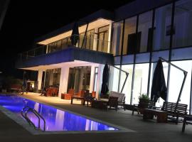Stoney Grey Hotel City Center，位于Oba Ile的酒店