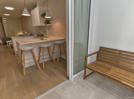 Apartamentos Bela，位于坎加斯德穆拉索的酒店