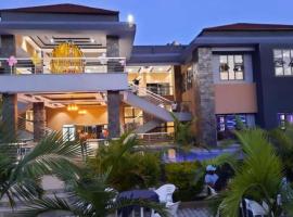 Palm Kalash Hotel，位于卢萨卡肯尼思·卡翁达国际机场 - LUN附近的酒店