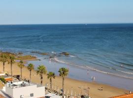 Varandas do Mar Apartamento T2R frente mar Olhos de gua Albufeira，位于奥霍斯德古阿的酒店