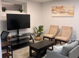 Well furnished 1 Bedroom Basement Suite，位于温尼伯的酒店