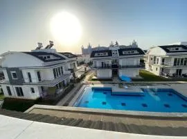 Appartement Duplex en résidence Privée avec piscine